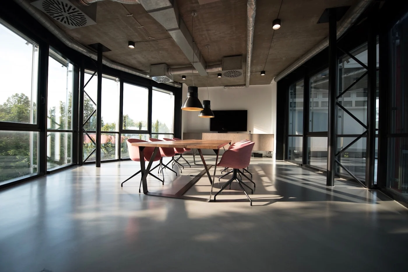 An open workspace with natural light and practical furniture
